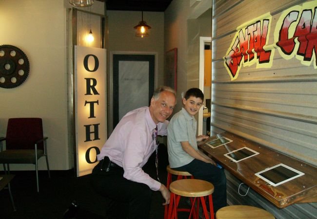 Teen with Dr. Z at the offices of Dental Care Teens in Stamford, CT