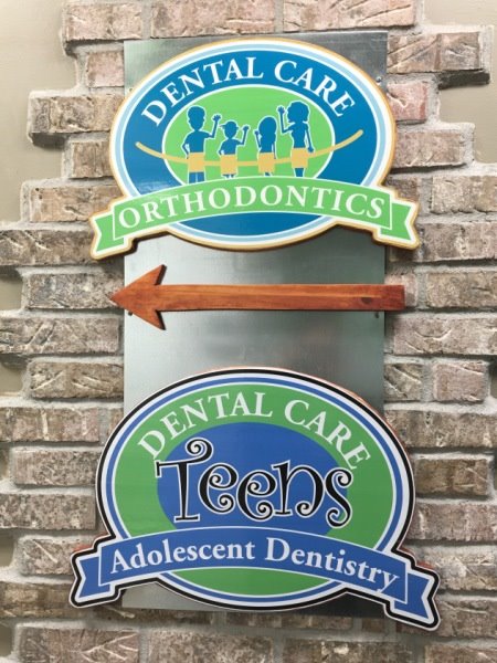 Teen and Orthodontic sign at the offices of Dental Care Teens in Stamford, CT